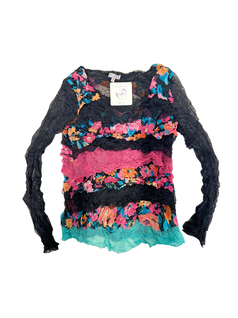 A long-sleeved top with crushed floral patterns in multicolor layers