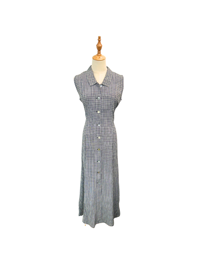 Frontal view of a Esprit Vintage Gingham Maxi Dress in black and white with white shell buttons