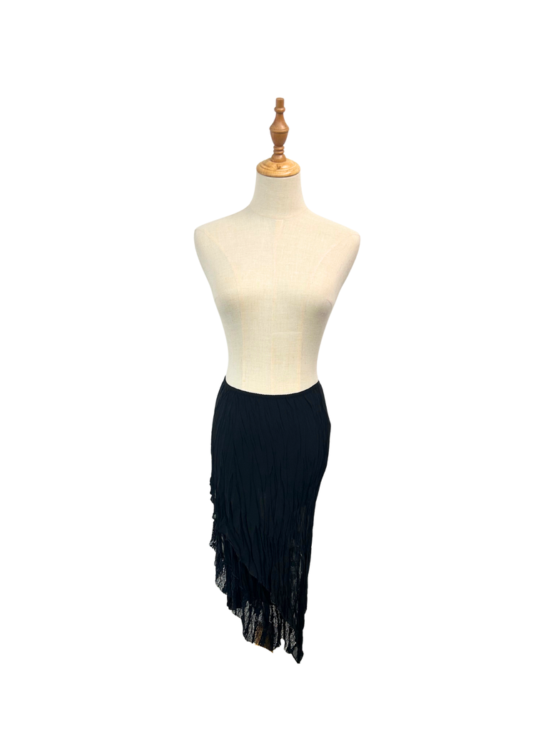 Frontal view of a black Lace Asymmetrical Skirt on a mannequin
