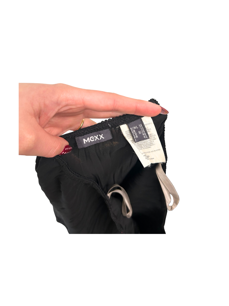 A closeup view of the label of a Mexx black Lace Asymmetrical Skirt