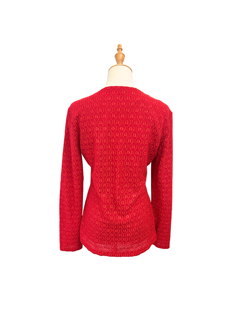 Back view of a STAX Vintage Long Sleeve Top in scarlet red that's made out of all over embroidered fabric and a gathered buckle detail in front
